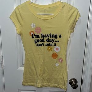 brand: wound up. size: XS (1). color: yellow with black writing